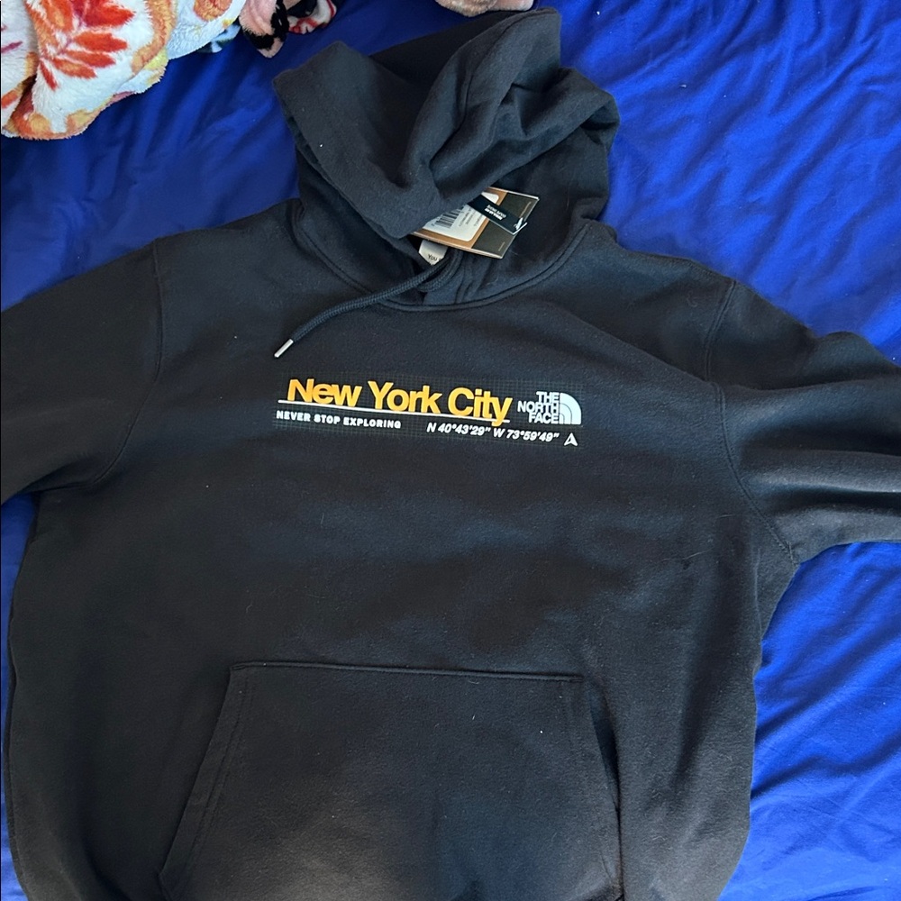 The North Face Black Hoodie with Yellow New York City Logo